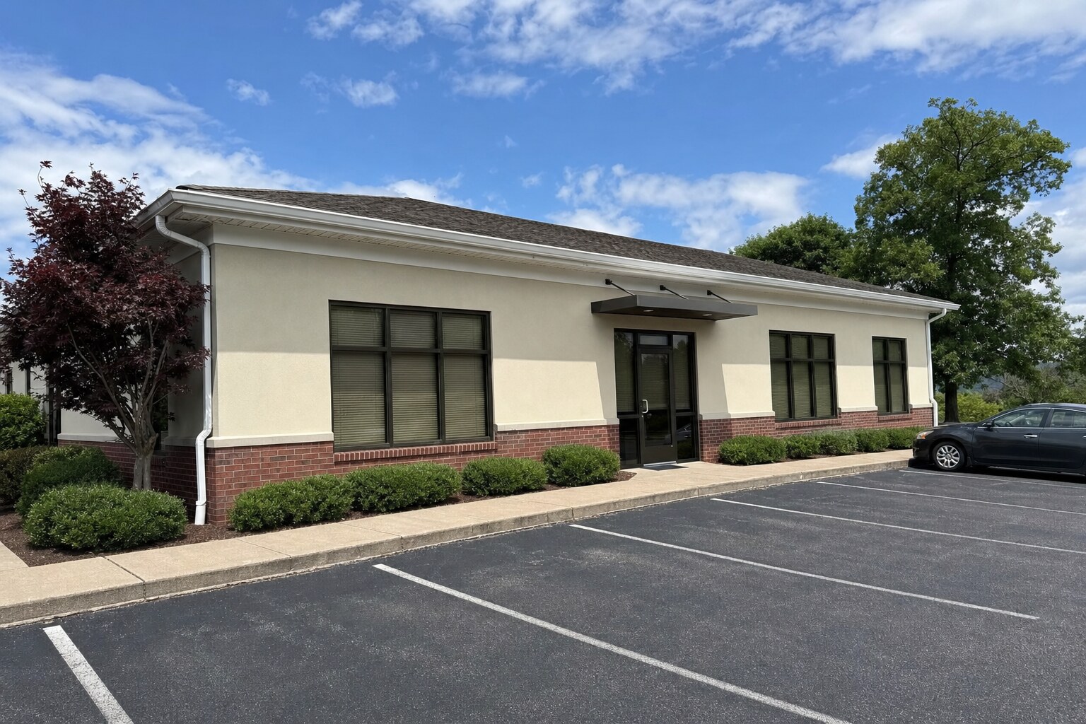 Small professional office building exterior, freshly soft-washed